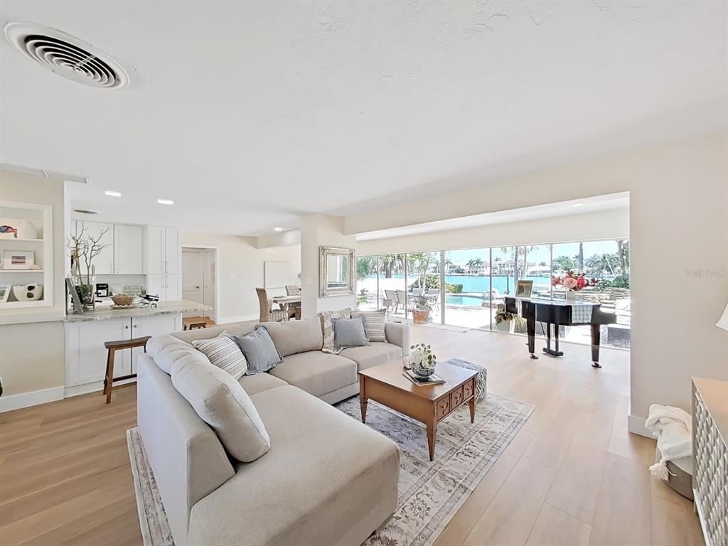 Interior, Kitchen, Living room, Piano, Recessed Lighting, Water, Wood Texture Flooring