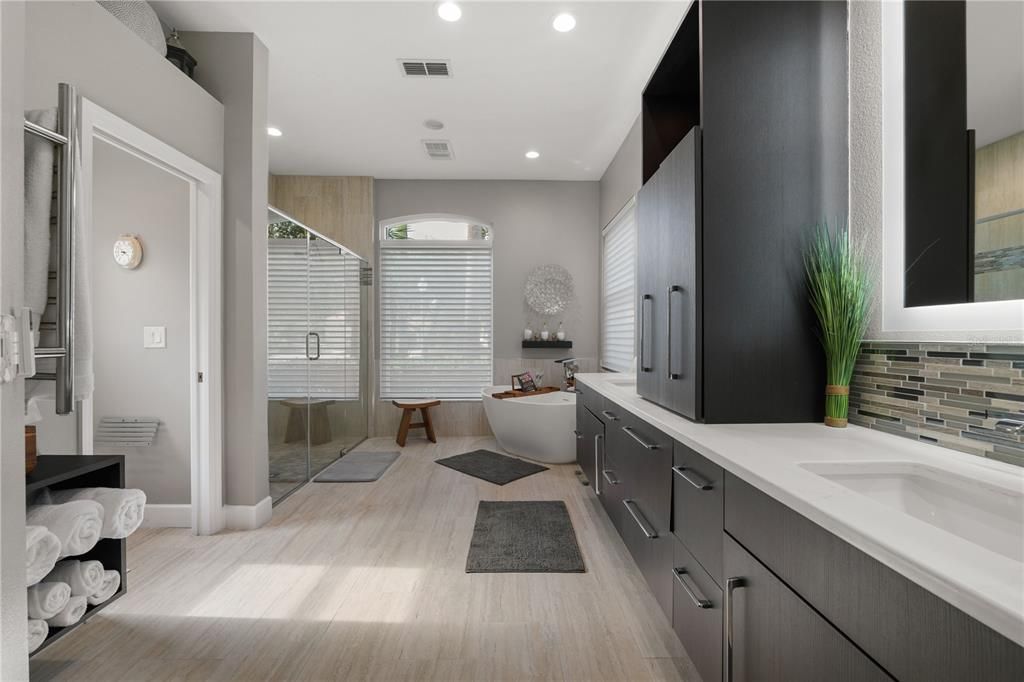 Bathroom, Dual Sink Vanities, Free Standing Baths, Interior, Recessed Lighting, Wood Texture Flooring