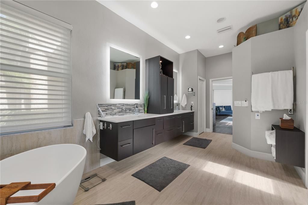 Bathroom, Dual Sink Vanities, Free Standing Baths, Interior, Recessed Lighting, Wood Texture Flooring
