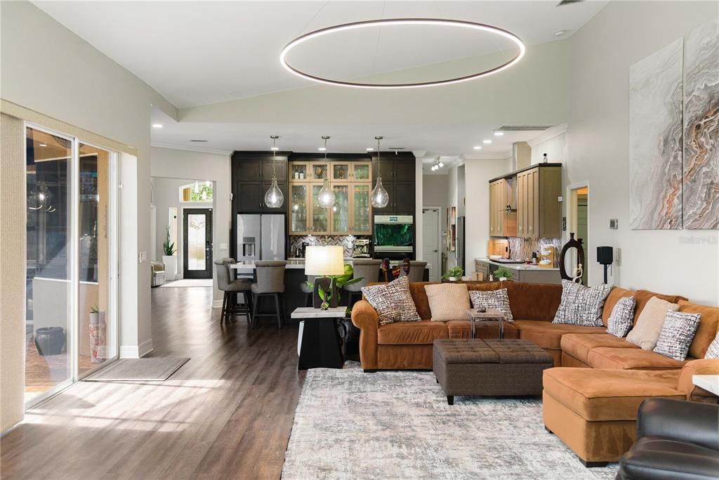 Dining room, Interior, Kitchen, Living room, Pendant Lights, Recessed Lighting, Stainless Steel Appliances, Wood Texture Flooring