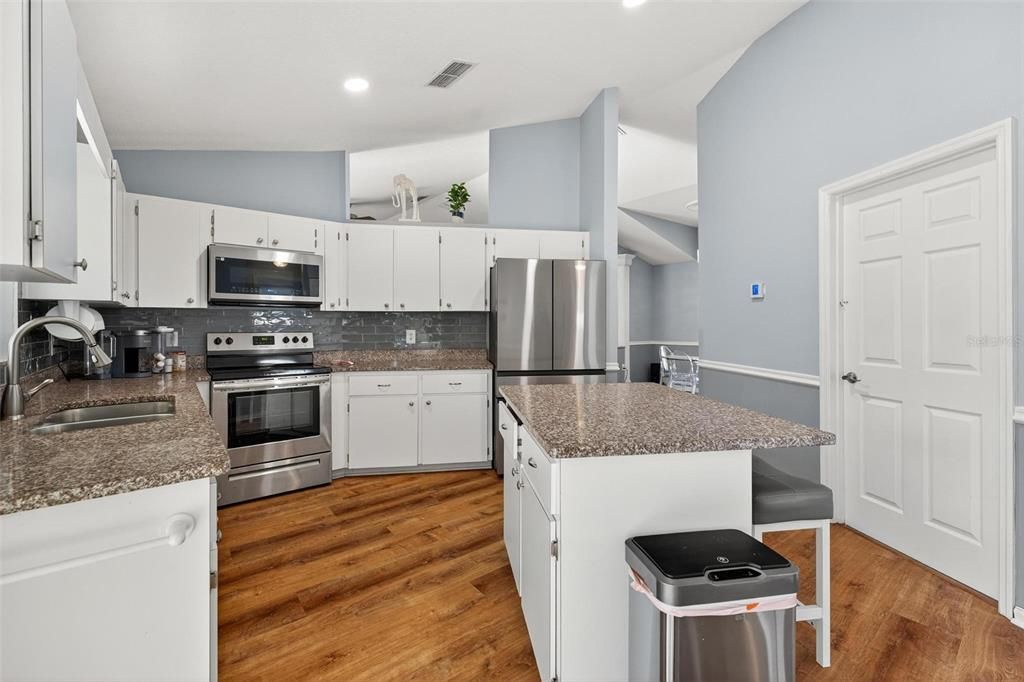 Interior, Kitchen, Recessed Lighting, Stainless Steel Appliances, Wood Texture Flooring