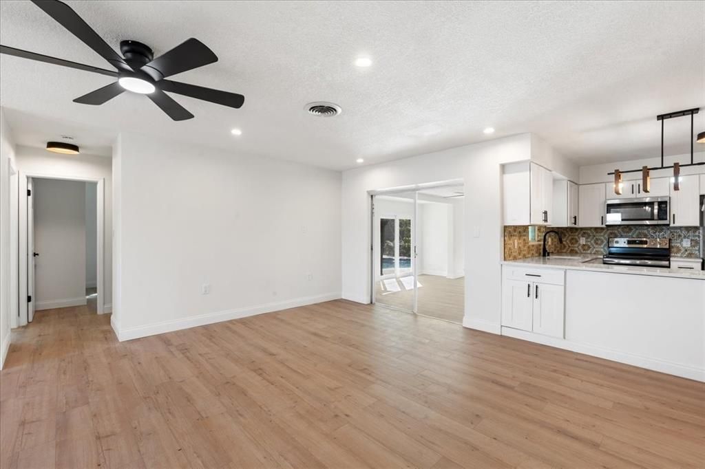 Empty room, Interior, Kitchen, Pendant Lights, Recessed Lighting, Wood Texture Flooring