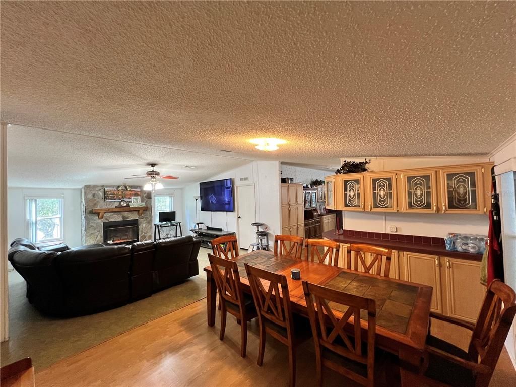 Dining room, Fireplace, Interior, Living room, Wood Texture Flooring