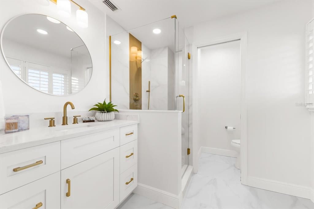 Bathroom, Dual Sink Vanities, Glass Shower, Interior, Marble, Recessed Lighting
