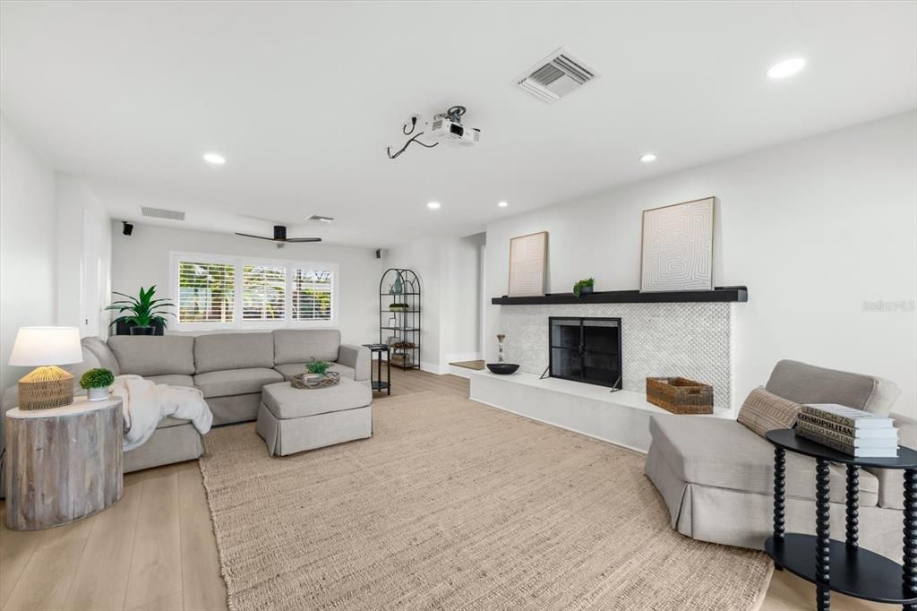 Fireplace, Interior, Living room, Recessed Lighting, Wood Texture Flooring