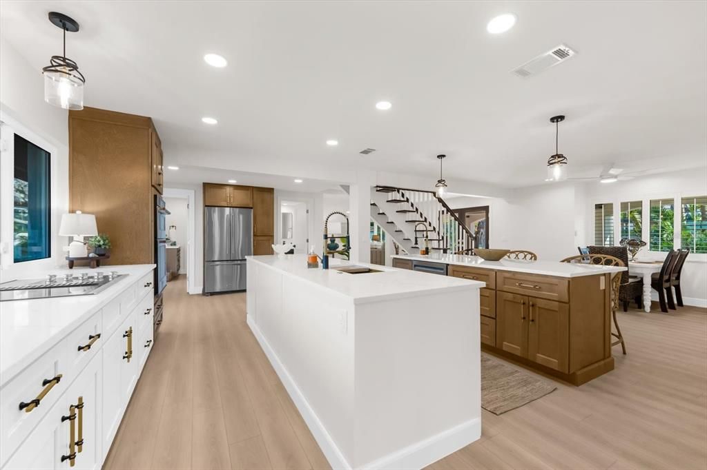 Dining room, Interior, Kitchen, Pendant Lights, Recessed Lighting, Stainless Steel Appliances, Wood Texture Flooring