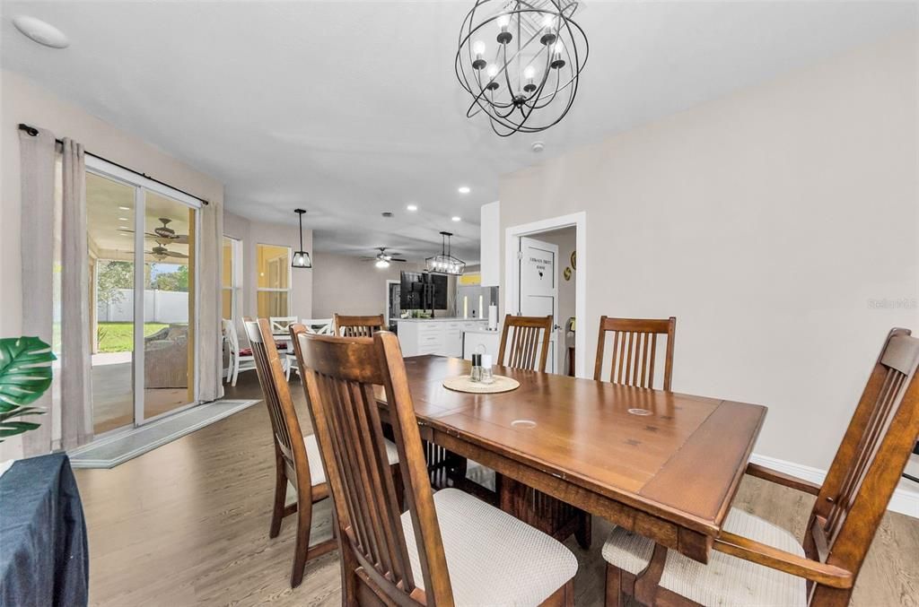 Chandelier, Dining room, Interior, Pendant Lights, Recessed Lighting, Wood Texture Flooring