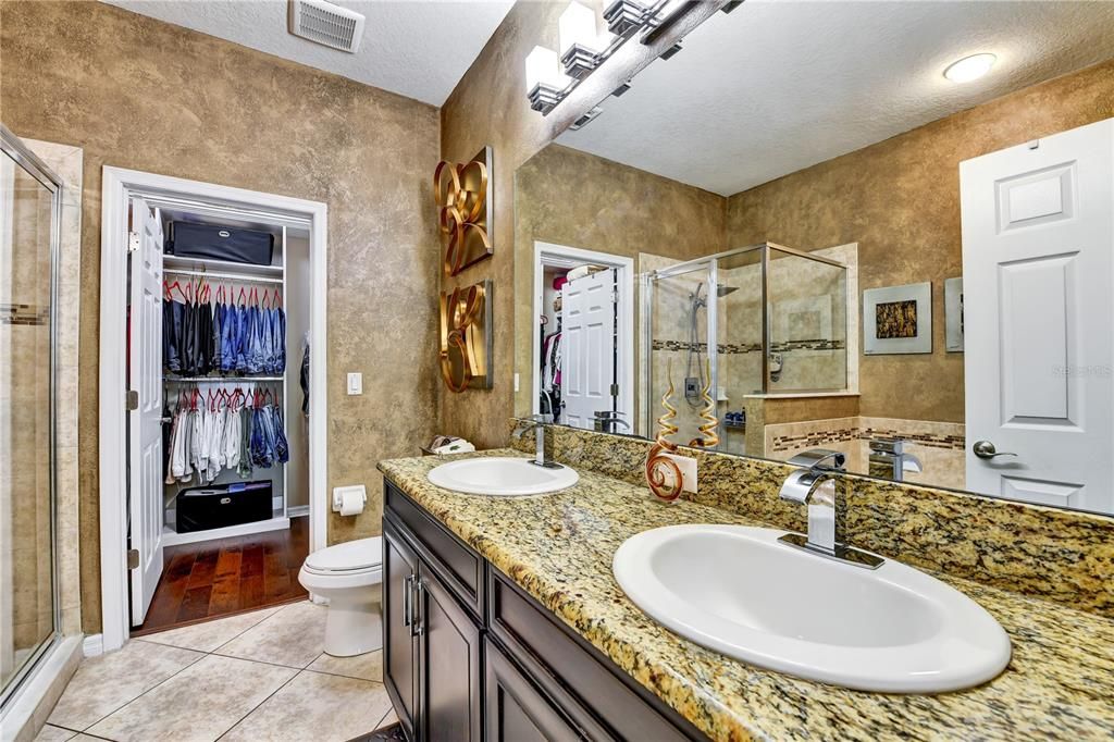 Bathroom, Dual Sink Vanities, Glass Shower, Interior, Recessed Lighting, Walk-in Closets, Wood Texture Flooring