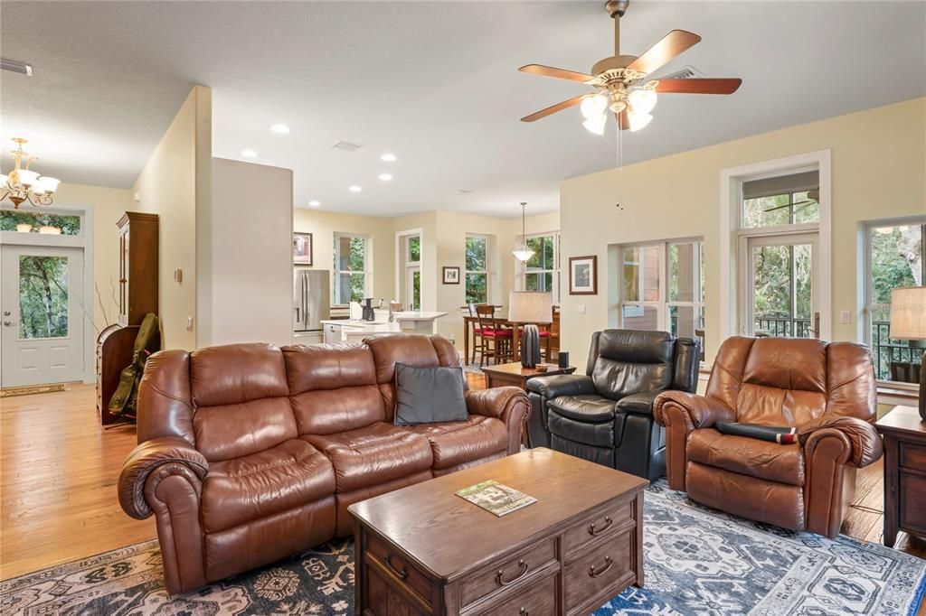 Chandelier, Dining room, Interior, Living room, Pendant Lights, Recessed Lighting, Wood Texture Flooring