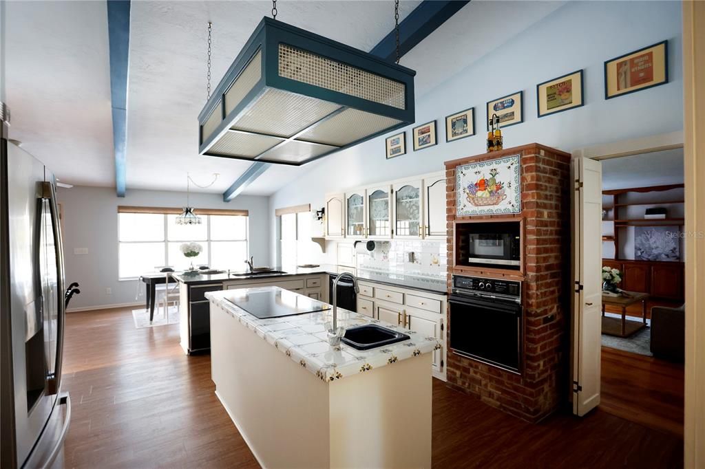 Interior, Kitchen, Pendant Lights, Tile Countertops, Wood Texture Flooring