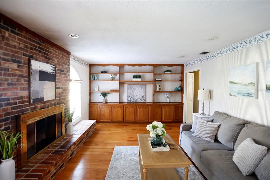 Fireplace, Interior, Living room, Recessed Lighting, Stone Walls, Wood Texture Flooring