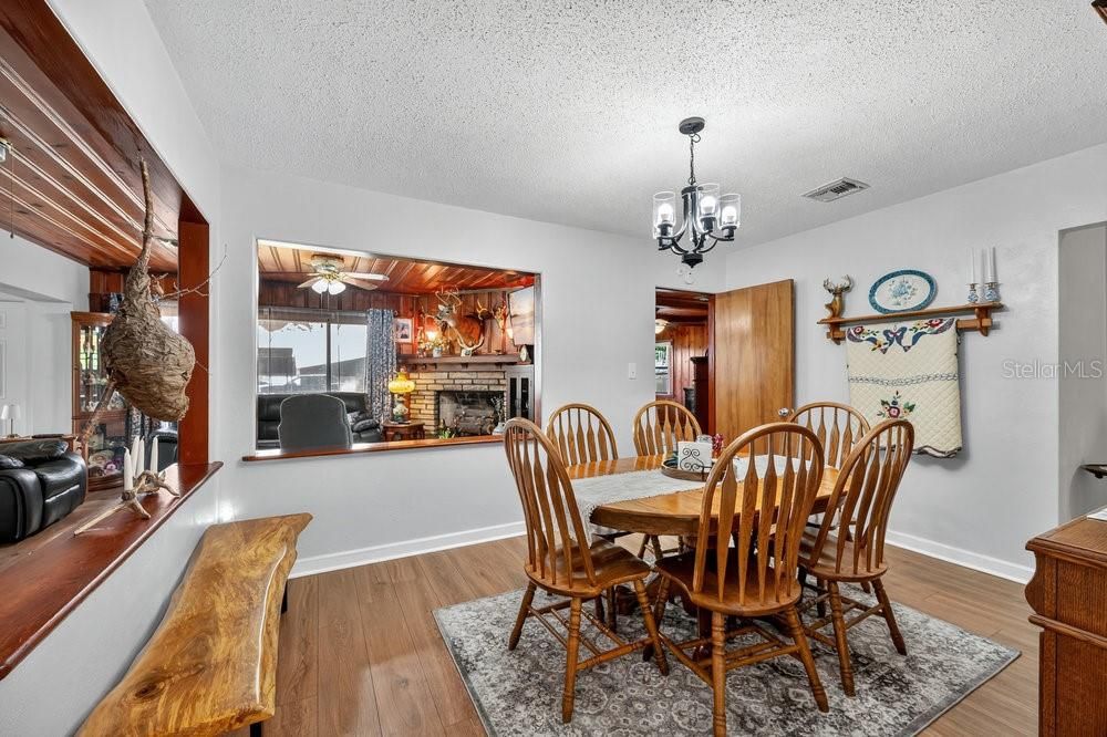 Chandelier, Dining room, Fireplace, Interior, Wood Texture Flooring