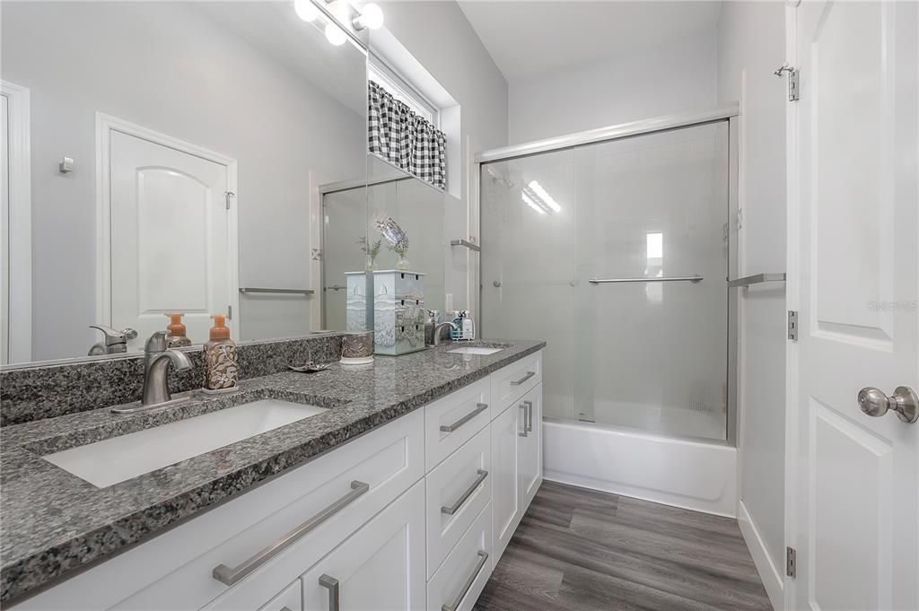 Bathroom, Dual Sink Vanities, Glass Shower, Interior, Wood Texture Flooring