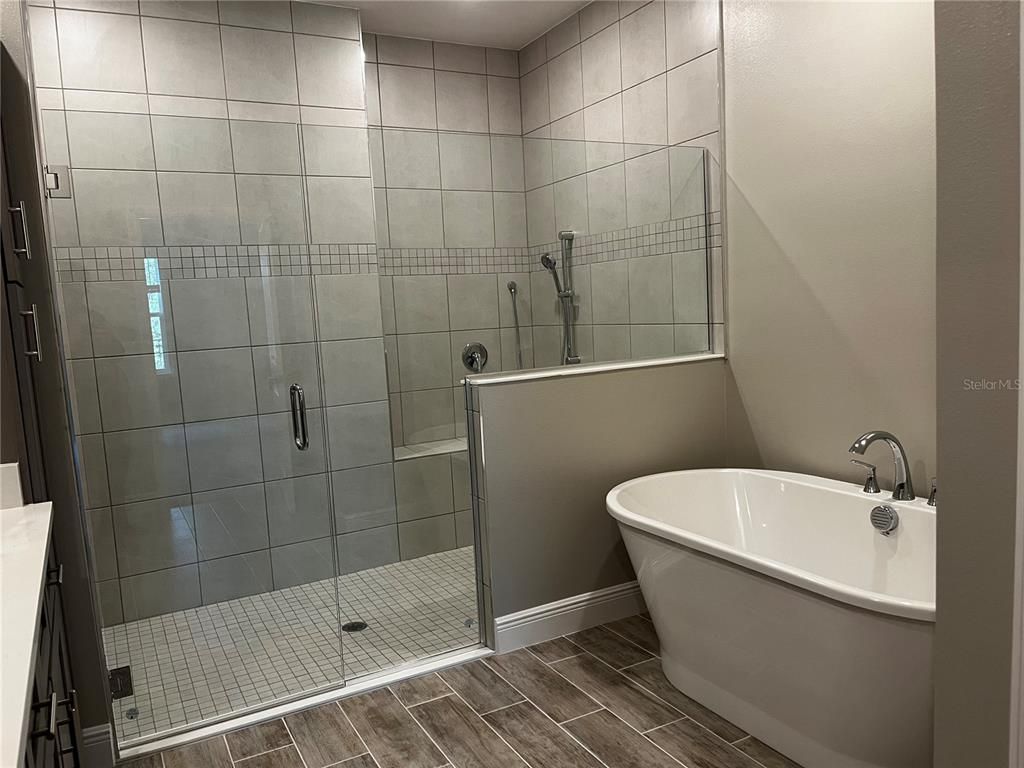 Bathroom, Free Standing Baths, Glass Shower, Interior, Wood Texture Flooring