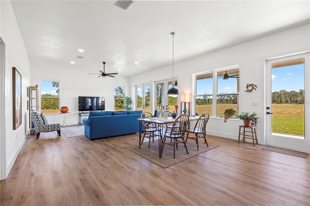 Dining room, Interior, Living room, Pendant Lights, Recessed Lighting, Wood Texture Flooring
