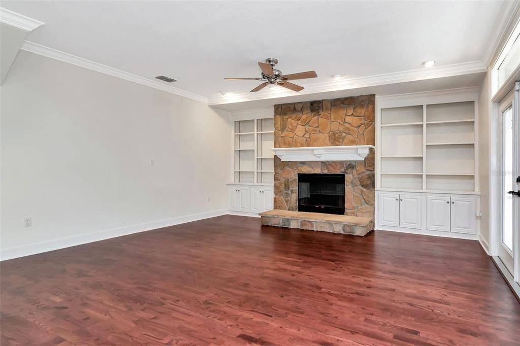 Empty room, Fireplace, Interior, Recessed Lighting, Wood Texture Flooring