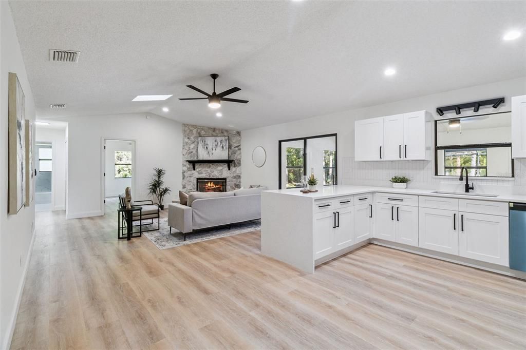 Fireplace, Interior, Kitchen, Living room, Recessed Lighting, Wood Texture Flooring