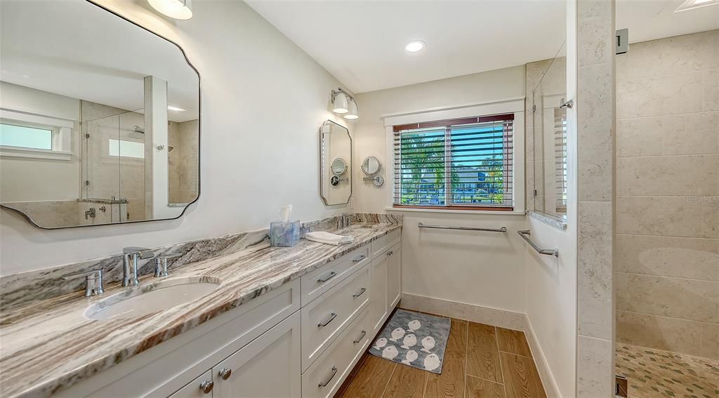 Bathroom, Dual Sink Vanities, Glass Shower, Interior, Recessed Lighting, Wood Texture Flooring