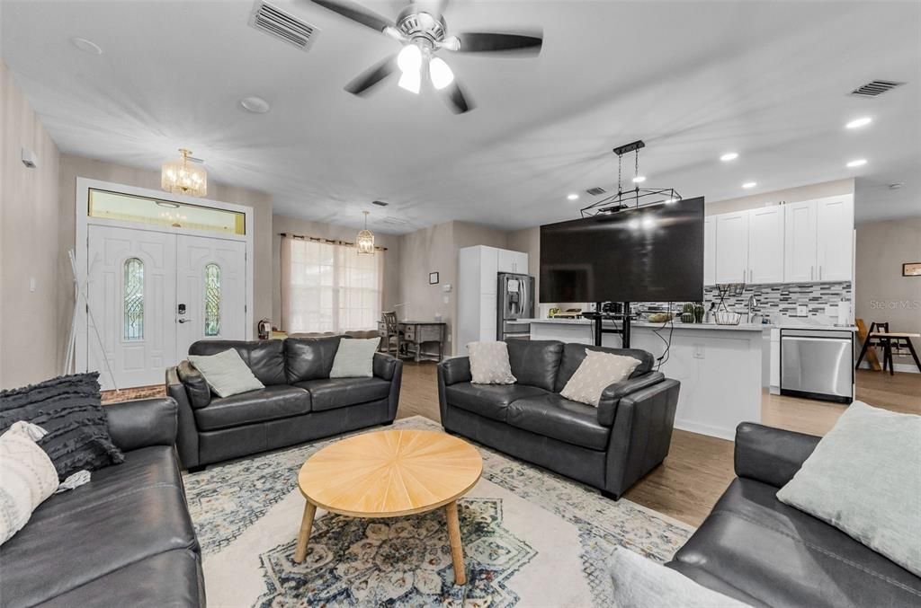 Chandelier, Dining room, Interior, Kitchen, Living room, Pendant Lights, Recessed Lighting, Wood Texture Flooring