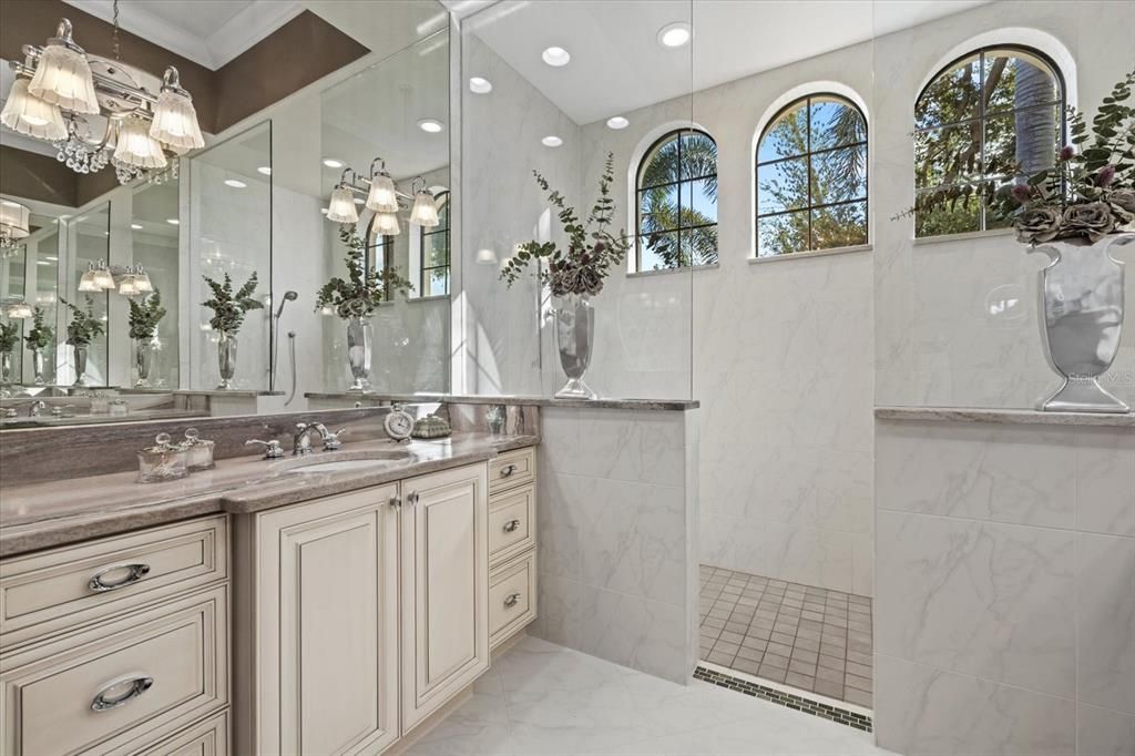 Bathroom, Dual Sink Vanities, Glass Shower, Interior, Marble, Marble Walls, Recessed Lighting