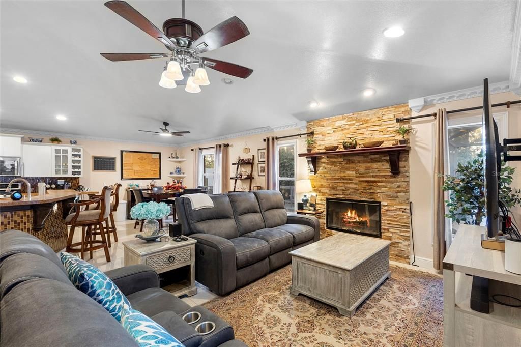 Dining room, Fireplace, Interior, Kitchen, Living room, Recessed Lighting, Stone Walls