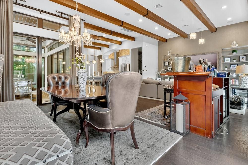 Chandelier, Dining room, Interior, Recessed Lighting, Wooden Beams, Wood Texture Flooring