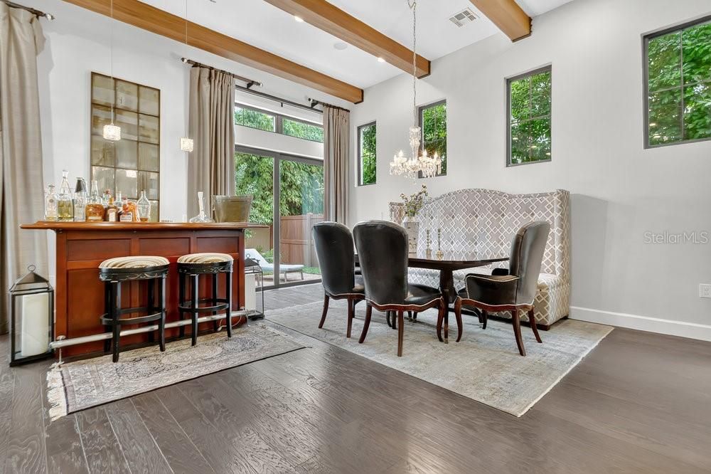 Chandelier, Dining room, Interior, Pendant Lights, Recessed Lighting, Wooden Beams, Wood Texture Flooring