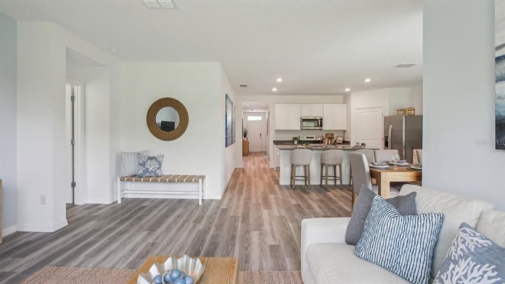Dining room, Interior, Kitchen, Living room, Recessed Lighting, Stainless Steel Appliances, Wood Texture Flooring