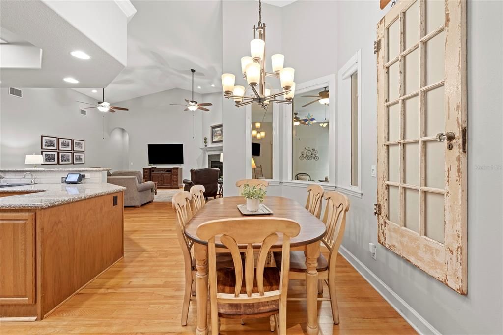 Chandelier, Dining room, Interior, Living room, Pendant Lights, Recessed Lighting, Wood Texture Flooring