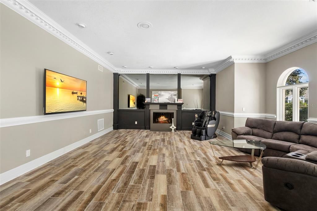 Fireplace, Interior, Living room, Recessed Lighting, Wood Texture Flooring