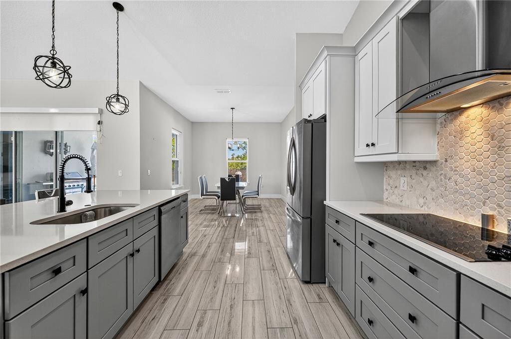 Dining room, Interior, Kitchen, Pendant Lights, Stainless Steel Appliances, Wood Texture Flooring