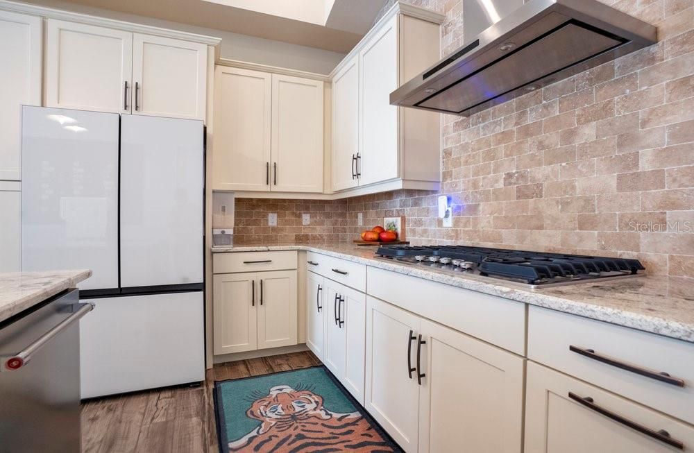 Interior, Kitchen, Stainless Steel Appliances, Stone Walls, Wood Texture Flooring