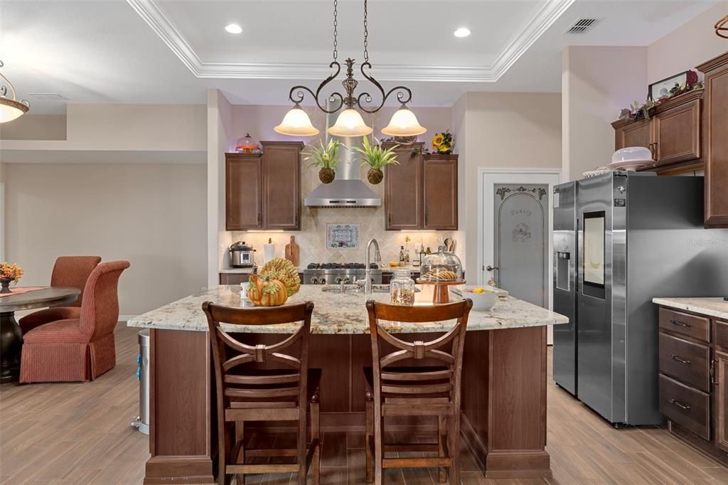 Chandelier, Interior, Kitchen, Recessed Lighting, Stainless Steel Appliances, Wood Texture Flooring
