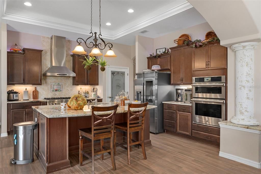 Chandelier, Interior, Kitchen, Pendant Lights, Recessed Lighting, Stainless Steel Appliances, Wood Texture Flooring
