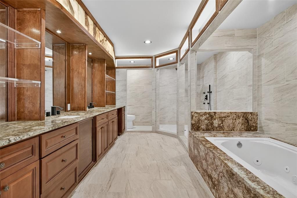 Bathroom, Dual Sink Vanities, Glass Shower, Interior, Marble, Marble Walls, Recessed Lighting