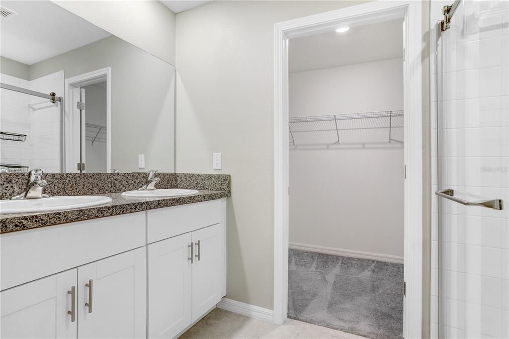 Bathroom, Dual Sink Vanities, Interior, Recessed Lighting, Walk-in Closets