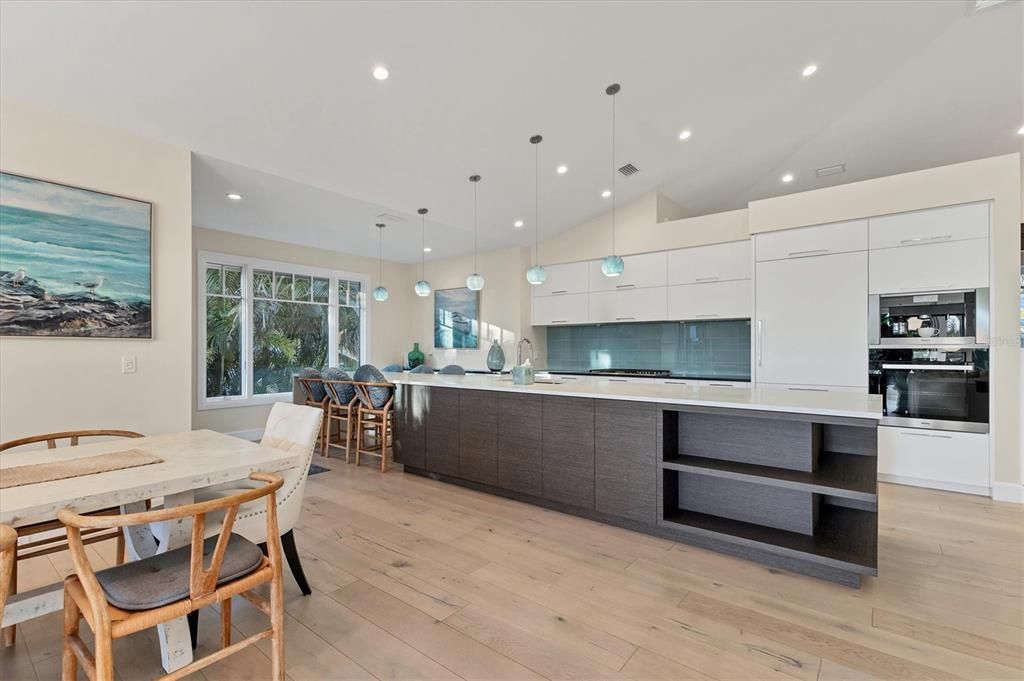 Dining room, Interior, Kitchen, Pendant Lights, Recessed Lighting, Stainless Steel Appliances, Wood Texture Flooring