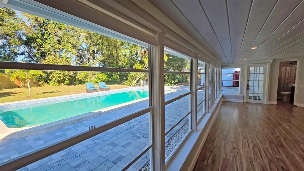 Interior, Pool, Recessed Lighting, Sun Room, Wood Texture Flooring