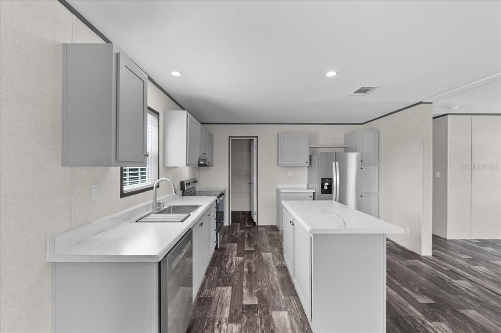 Interior, Kitchen, Recessed Lighting, Stainless Steel Appliances, Wood Texture Flooring
