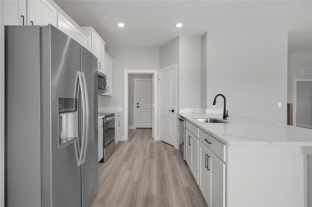 Interior, Kitchen, Recessed Lighting, Stainless Steel Appliances, Wood Texture Flooring