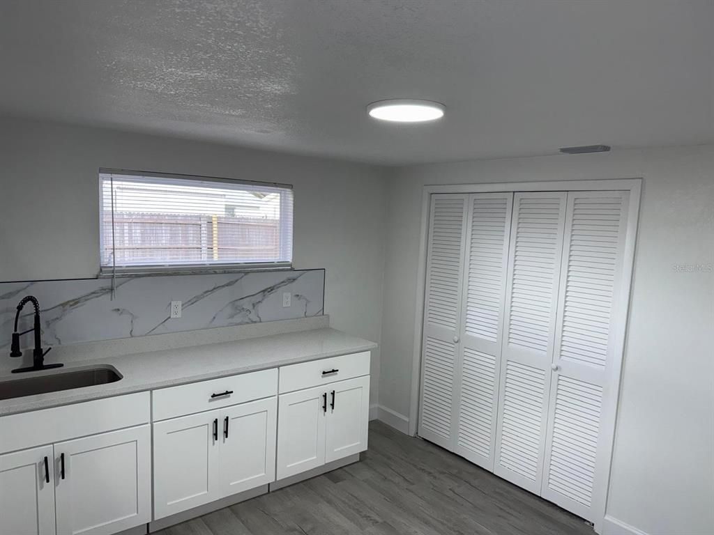 Interior, Kitchen, Marble Walls, Recessed Lighting, Wood Texture Flooring