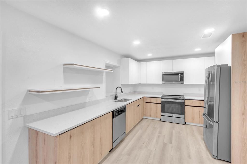 Interior, Kitchen, Recessed Lighting, Stainless Steel Appliances, Wood Texture Flooring