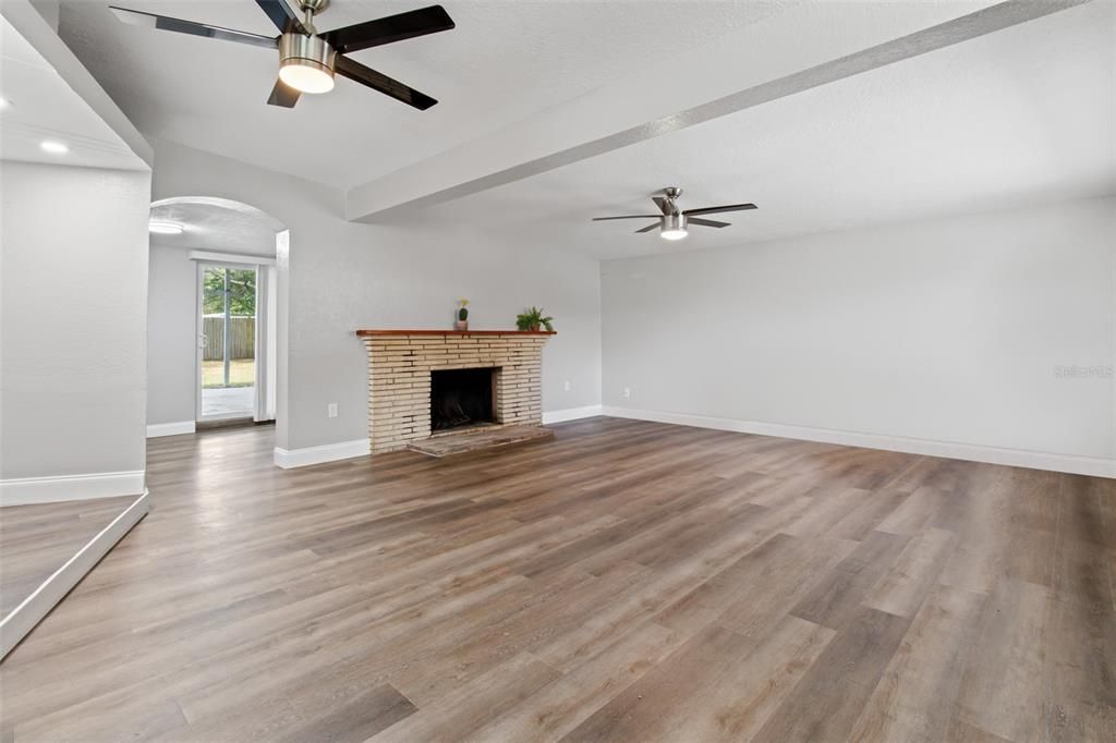 Empty room, Fireplace, Interior, Recessed Lighting, Wood Texture Flooring