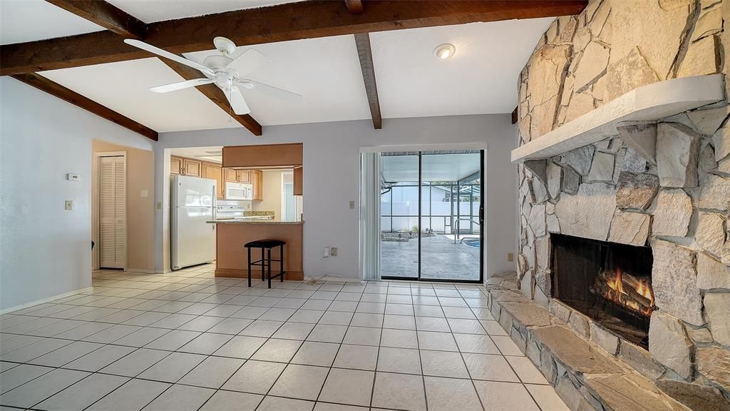 Fireplace, Interior, Kitchen, Recessed Lighting, Stone Walls, Wooden Beams