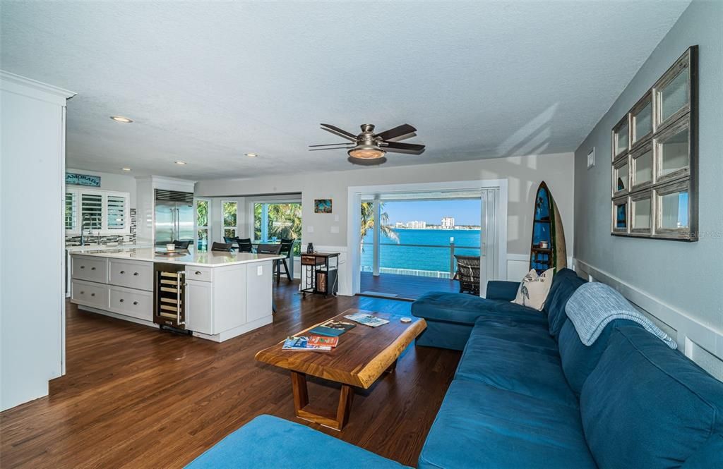 Dining room, Interior, Kitchen, Living room, Recessed Lighting, Water, Wood Texture Flooring