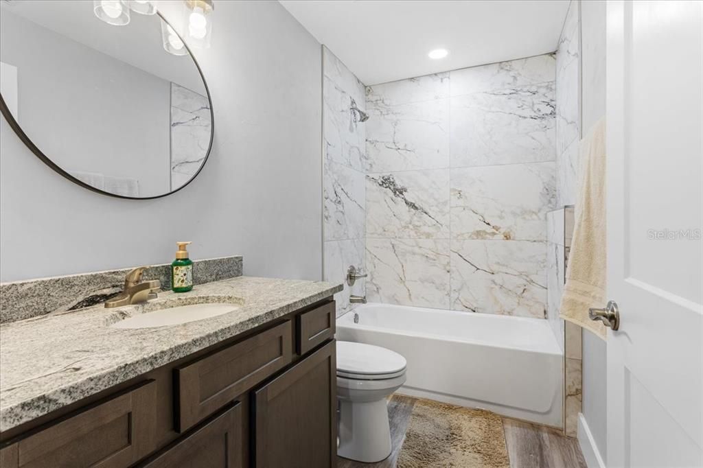 Bathroom, Interior, Marble Walls, Recessed Lighting, Wood Texture Flooring