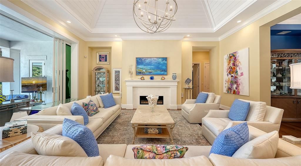 Chandelier, Fireplace, Interior, Living room, Recessed Lighting, Wood Texture Flooring