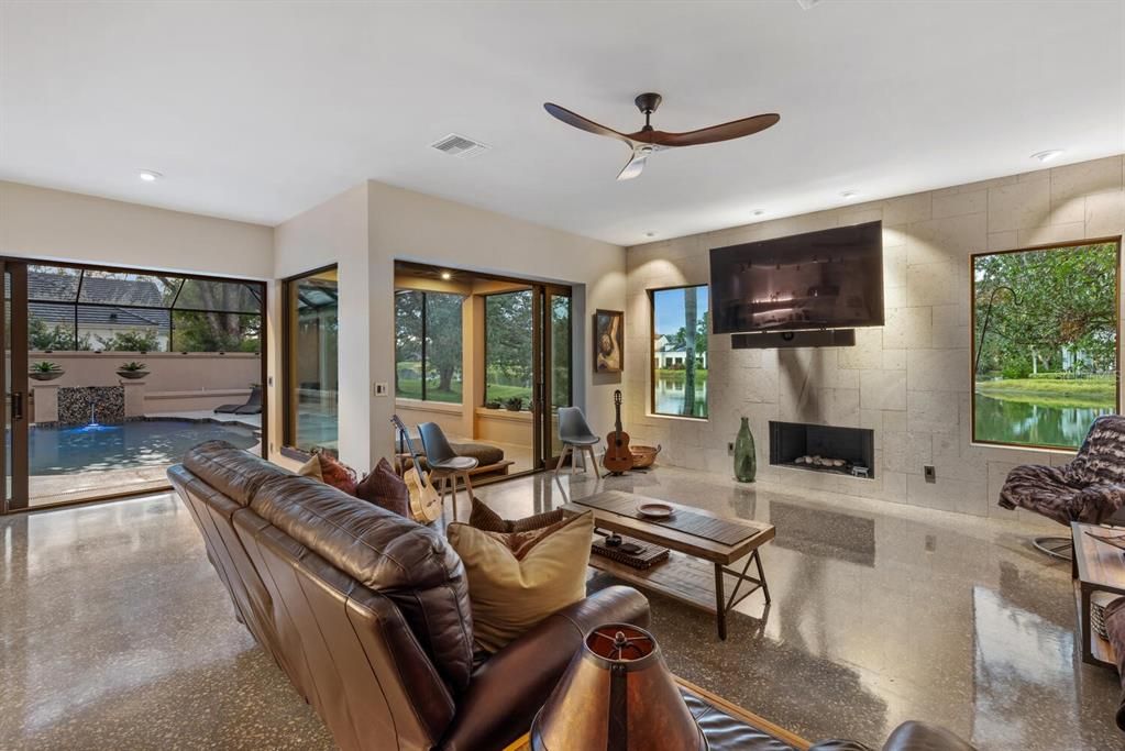 Fireplace, Interior, Living room, Pool, Recessed Lighting, Stone Walls