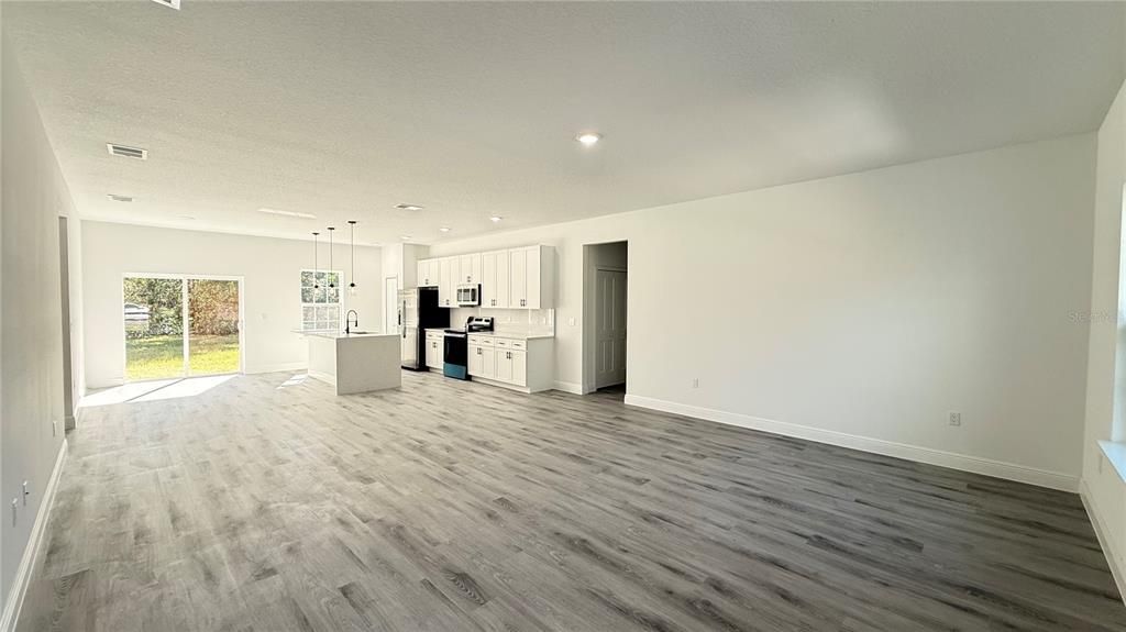 Empty room, Interior, Kitchen, Pendant Lights, Recessed Lighting, Wood Texture Flooring