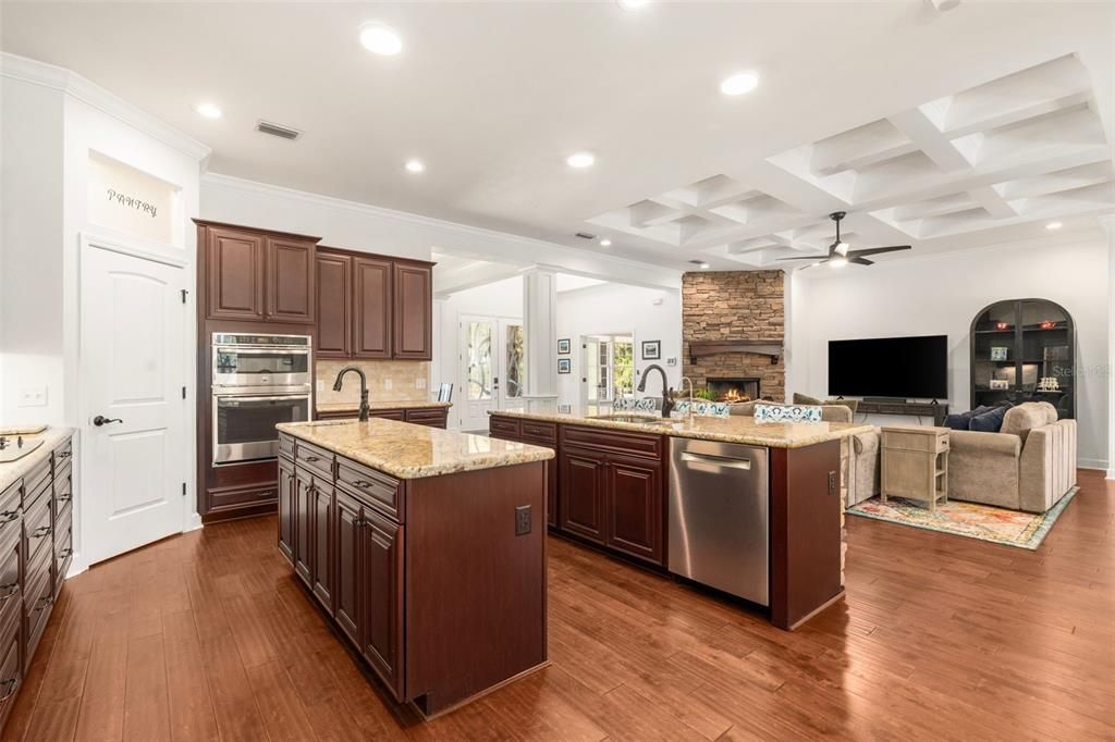 Fireplace, Interior, Kitchen, Living room, Recessed Lighting, Stainless Steel Appliances, Wood Texture Flooring